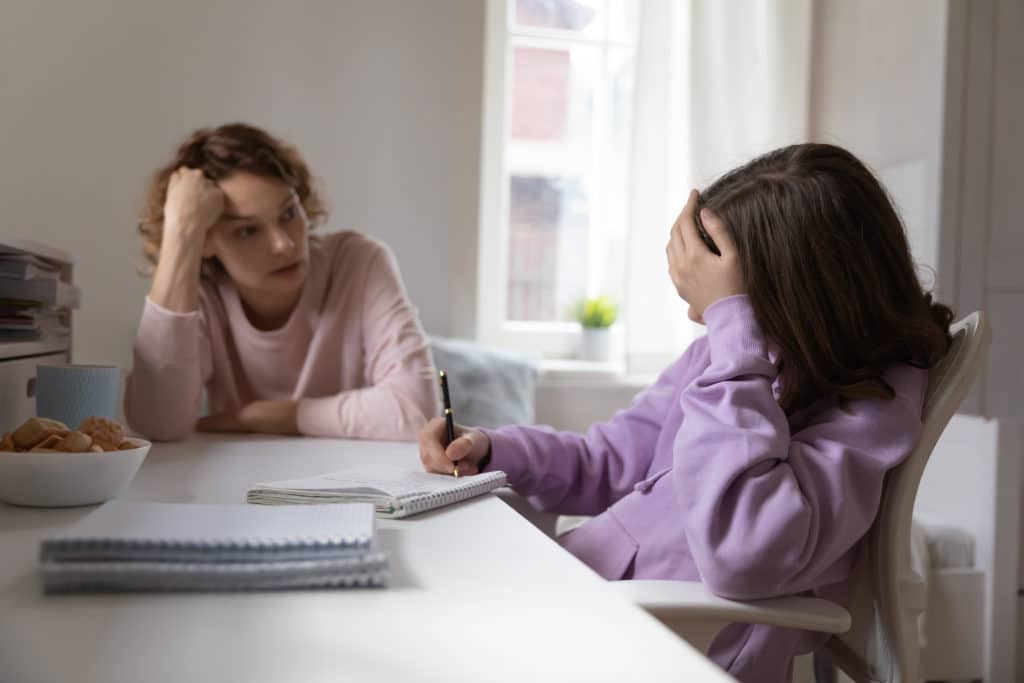Mother and daughter doing homework